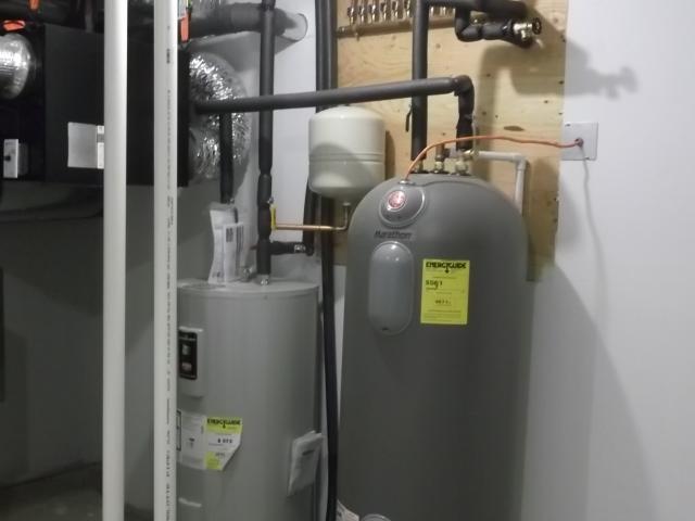 The home is equipped with an ultra-efficient ground source heat pump that provides heating, cooling, and domestic hot water. On-demand hot water is provided with a central manifold and homerun distribution system that helps minimize the amount of water that is wasted down the drain while waiting for hot water.