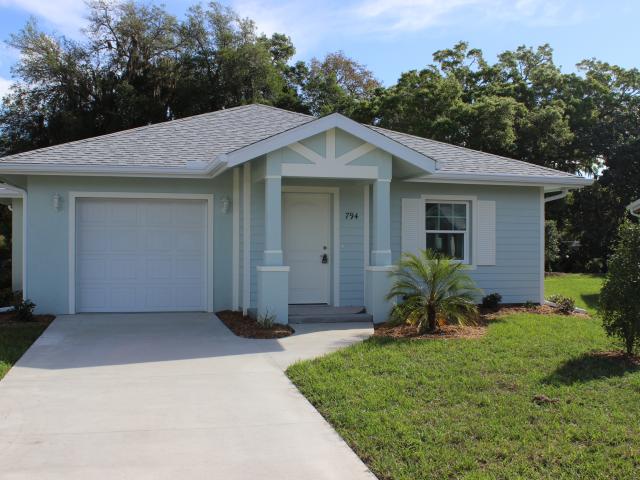 Even without solar panels, the energy-efficient features of these Habitat for Humanity homes reduce energy costs to about $70 per month, helping to make them more affordable for their homeowners.