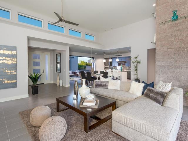 Clerestory windows and extra-wide sliding doors flood the interior of the home with natural daylight.