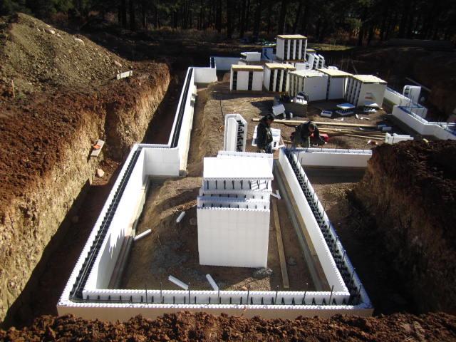 ICF blocks stack and stay in place, creating the insulating â€œformâ€ for the poured concrete below-grade foundation walls and wrapping the basement in a continuous blanket of R-22 insulation.