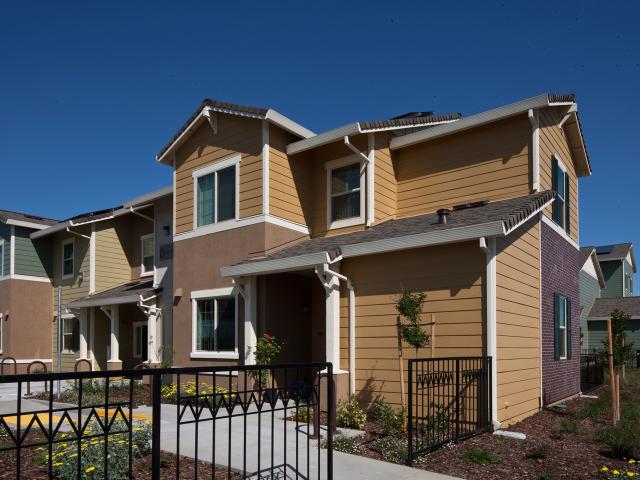 Mutual Housing installed a variety of durable siding materials including fiber cement, stucco, and brick veneer over the energy-saving advanced framing with 2-by-6 walls.