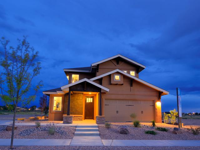 The stucco cladding covers energy-saving wall framing with 2-by-6 studs spaced 24-inch on-center that are sealed at all seams with sealant and filled with R-21 of blown fiberglass. A double layer of tar paper provides a drainage plane over the sheathing that allows water to drain even when the stucco bonds to the first layer.