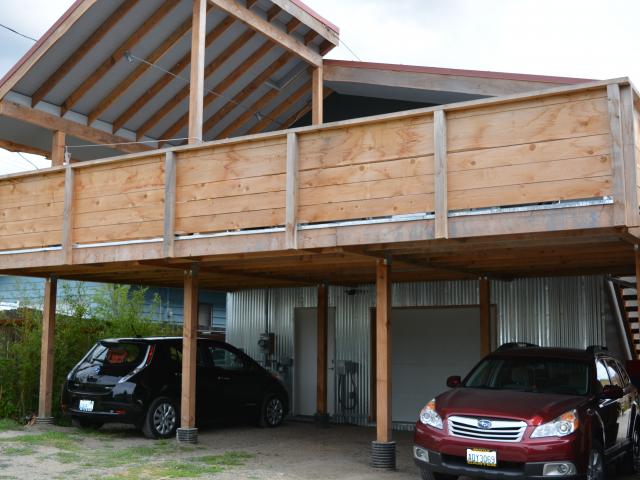 Thanks to an ultra-efficient design and a 9-kW roof-mounted solar electric system, the home achieves a HERS score of -12 and produces enough electricity to offset the power needs of the home and two electric cars.