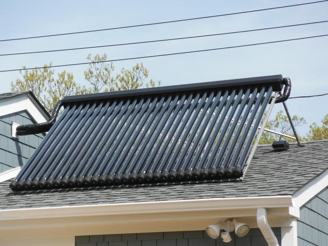 The home's solar water heating system includes two 30-tube evacuated tube panels and a 120-gallon storage tank with electric backup.