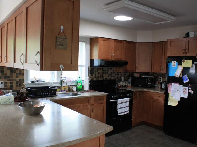 The remodeled kitchen features an energy-saving ENERGY STAR-rated refrigerator and dishwasher.