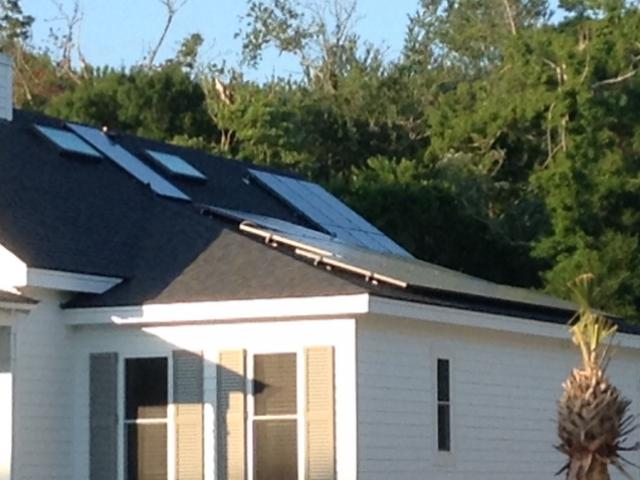 A 6-kW solar electric system meets all of the electricity needs of this home.