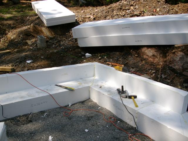 The ultra-efficient foundation insulation includes R-28 of rigid foam at the perimeter and 18 inches below grade.