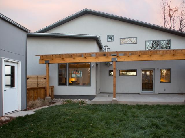 Boulder ZED fit the 2,504-square-foot home on a small urban infill lot using natural comfort orientation to maximize the potential to capture beneficial solar heat gain in the winter while blocking unwanted solar heat in the summer with solar window shading, including pergolas and roof overhangs.