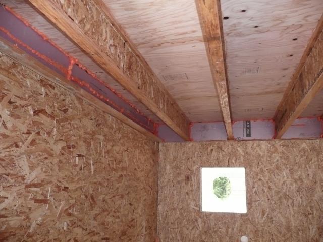 Comprehensive draft protection includes rigid foam insulation sprayed in the rim joists, and SIP panels glued together with a double bead of caulk.