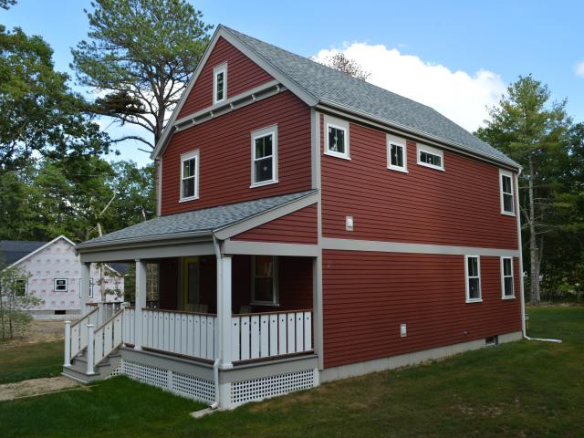 The 2,244-square-foot, two-story home features three bedrooms, 1.5 baths, a full basement, and a Home Energy Rating System (HERS) score of 47, far lower than a minimum-code home.