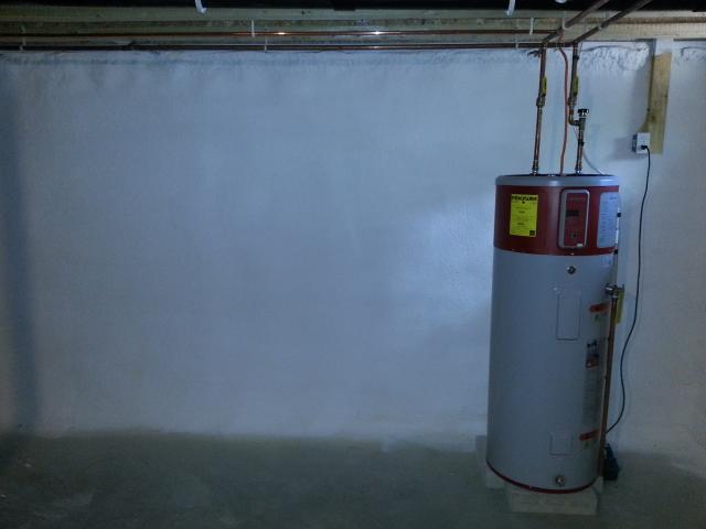 The home’s basement includes a high-efficiency heat pump water heater and high-efficient closed-cell spray foam insulation.