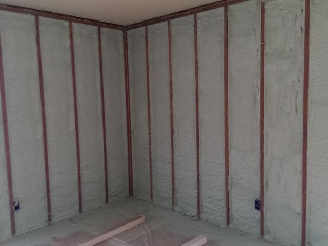 An ultra-efficient enclosure is created by installing R-39 closed-cell spray foam at the ceiling and under the floor (5.5 inches), and R-22 closed-cell foam inside the existing wall framing (3.5 inches). This thermal blanket contributes to enhanced quiet and comfort as well as a whole-house draft barrier.