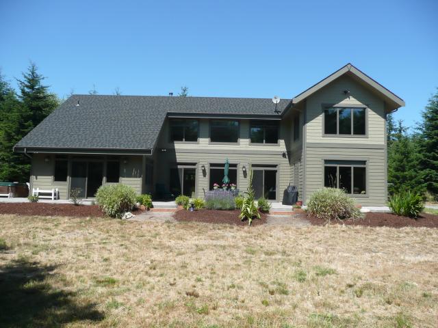 This custom home built on Whidbey Island in Washington state by Clifton View Homes is a certified U.S. DOE Zero Energy Ready Home that will save its homeowners more than $2,500 a year compared to a home built to minimum code.