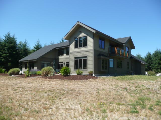 The 2,908-square-foot home was designed with the majority of the windows facing south to take advantage of the Puget Sound views, natural comfort, and daylight.