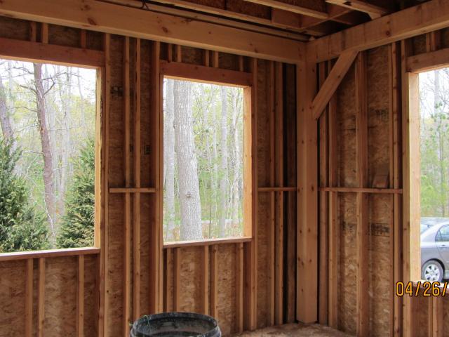 The Ferguson home is wrapped in a double-wall thermal blanket consisting of two 2-by-4 framed walls that form a 7-inch-thick wall cavity filled with blown-in fiberglass insulation.