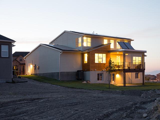 The ultra-efficient foundation insulation includes 2 inches of closed-cell rigid foam insulation installed on the exterior of the basement walls.