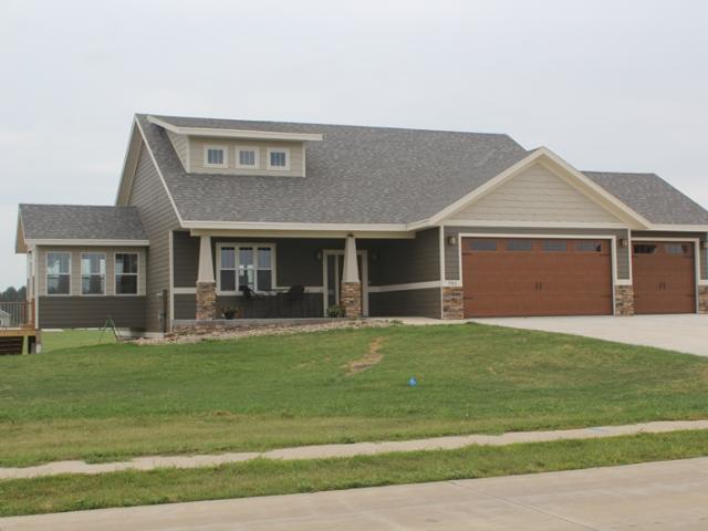 This home in Spirit Lake, Iowa, by Healthy Efficient Homes is certified as a U.S. DOE Zero Energy Ready Home that will save its owners over $5,000 a year in energy costs compared to a similar minimum-code home.