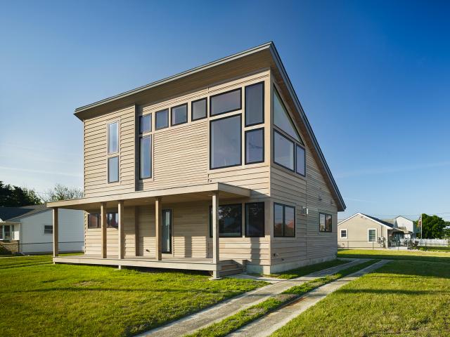 Windows are designed to capture views and light in John Hubert Associates' natural daylight home.