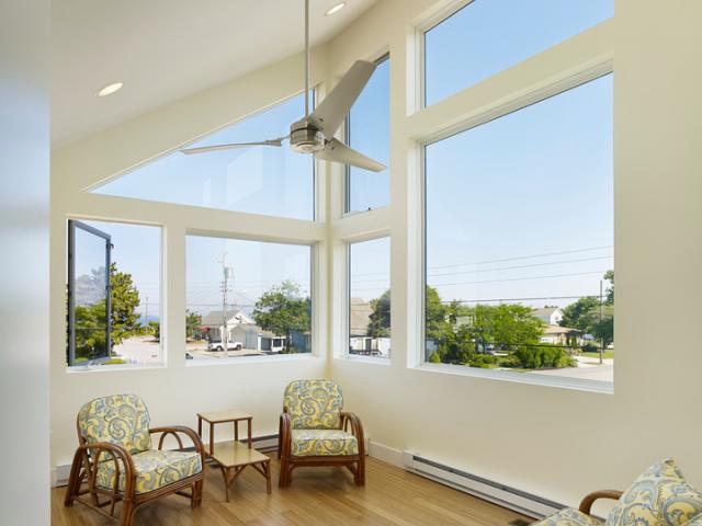 ENERGY STAR-rated ceiling fans and openable windows oriented to prevailing summer breezes help provide low-cost cooling.