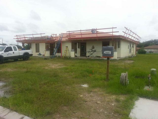 The home's hip-roof design resists roof uplift in high winds, resulting in a more hurricane-resistant home.