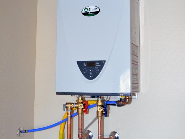 The home features high-efficiency endless hot water with a 95% efficient gas tankless water heater.