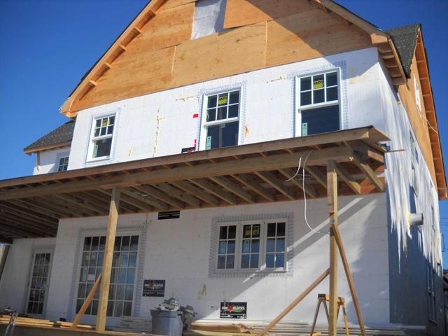 Insulated concrete form (ICF) wall construction provides a continuous thermal blanket with 13-inch-thick basement walls and 11-inch-thick above-ground walls.