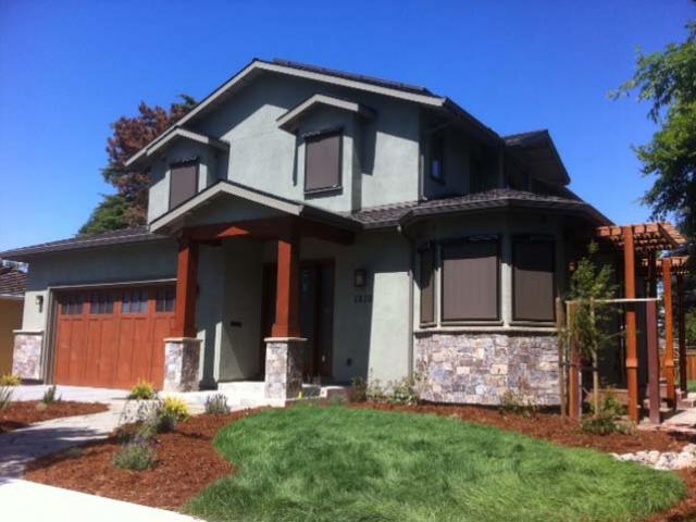 The traditional three-coat stucco hides the home's continuous thermal blanket construction with advanced framed wall technology. The wall construction includes 2-by-6, 24-inch on-center wall framing dense packed with R-23 of cellulose insulation plus a 1-inch thick continuous thermal blanket of rigid foam over the plywood sheathing.