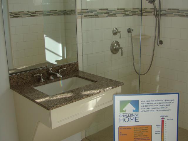 The handicapped-accessible bathrooms feature water-saving EPA WaterSense-labeled fixtures, recycled-content countertops, and Forest Stewardship Council-certified cabinetry.