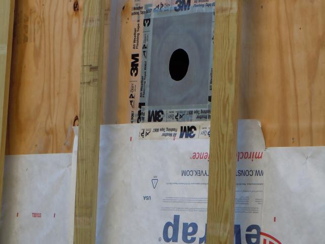 Comprehensive draft protection includes rubber gaskets at all pipe and wiring penetrations, sealing every seam in the plywood sheathing with a liquid sealant, and taping seams between the slab and foundation walls. The home is so airtight it exceeds the most rigorous industry standards for air sealing set by Passive House.