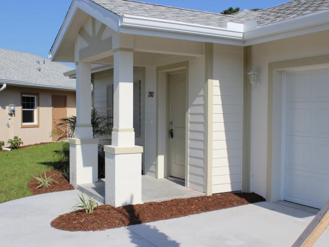 The natural comfort shading provided by a covered front porch and deep roof overhangs keeps the sun from overheating the interiors during hot summer days.