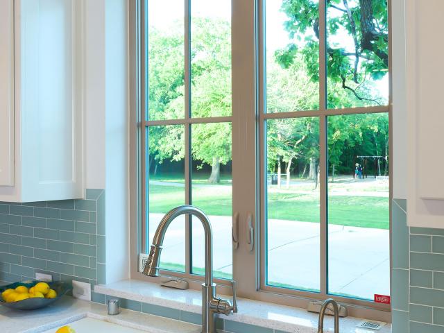 Water-saving fixtures and recycled glass countertops are among the resource-efficient features in this home.