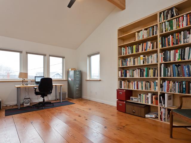 Natural daylight pours into the home through ultra-efficient triple-pane windows with insulated vinyl frames. The windows have an insulating argon gas fill between the glass panes, and the glass is coated with an invisible low-emissivity coating to minimize winter heat loss and summer heat gain.