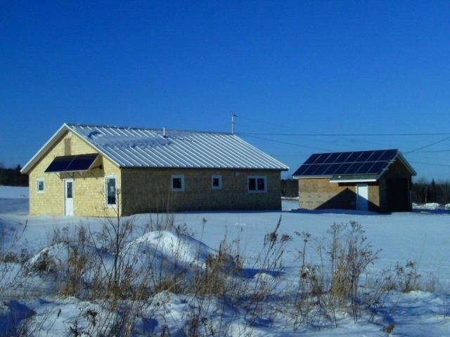 With a solar electric system, this home produces nearly as much energy as it uses each year with monthly utility bills averaging less than $30.