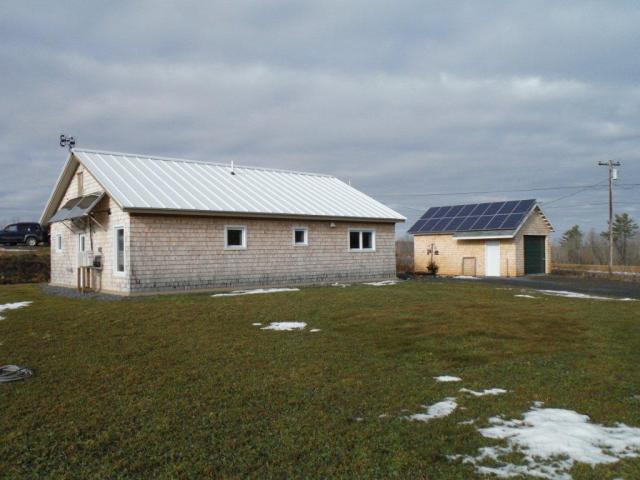 The detached garage completely separates the home from residual car exhaust, emissions from stored fuel and paints, and other contaminants associated with garages.