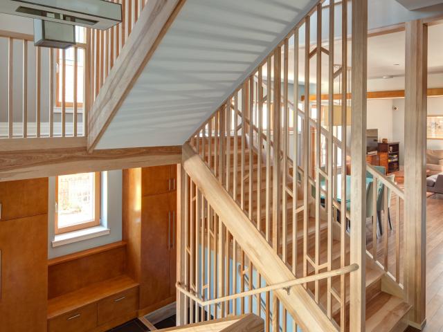 Numerous triple-pane windows allow sunlight to fill the natural daylight home.