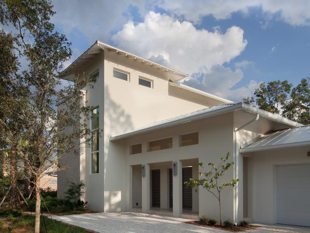 This custom home by e2 Homes in Winter Park, Florida, was the first home in the country certified to the strict performance criteria of the U.S. DOE Zero Energy Ready Home program.