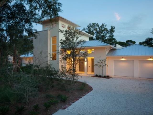 The roof design, metal roofing, and steel-reinforced autoclaved aerated concrete wall construction help make this a disaster-resistant home. Risks prevalent to Florida include pests, termites, hurricanes, high winds, and wildfires.